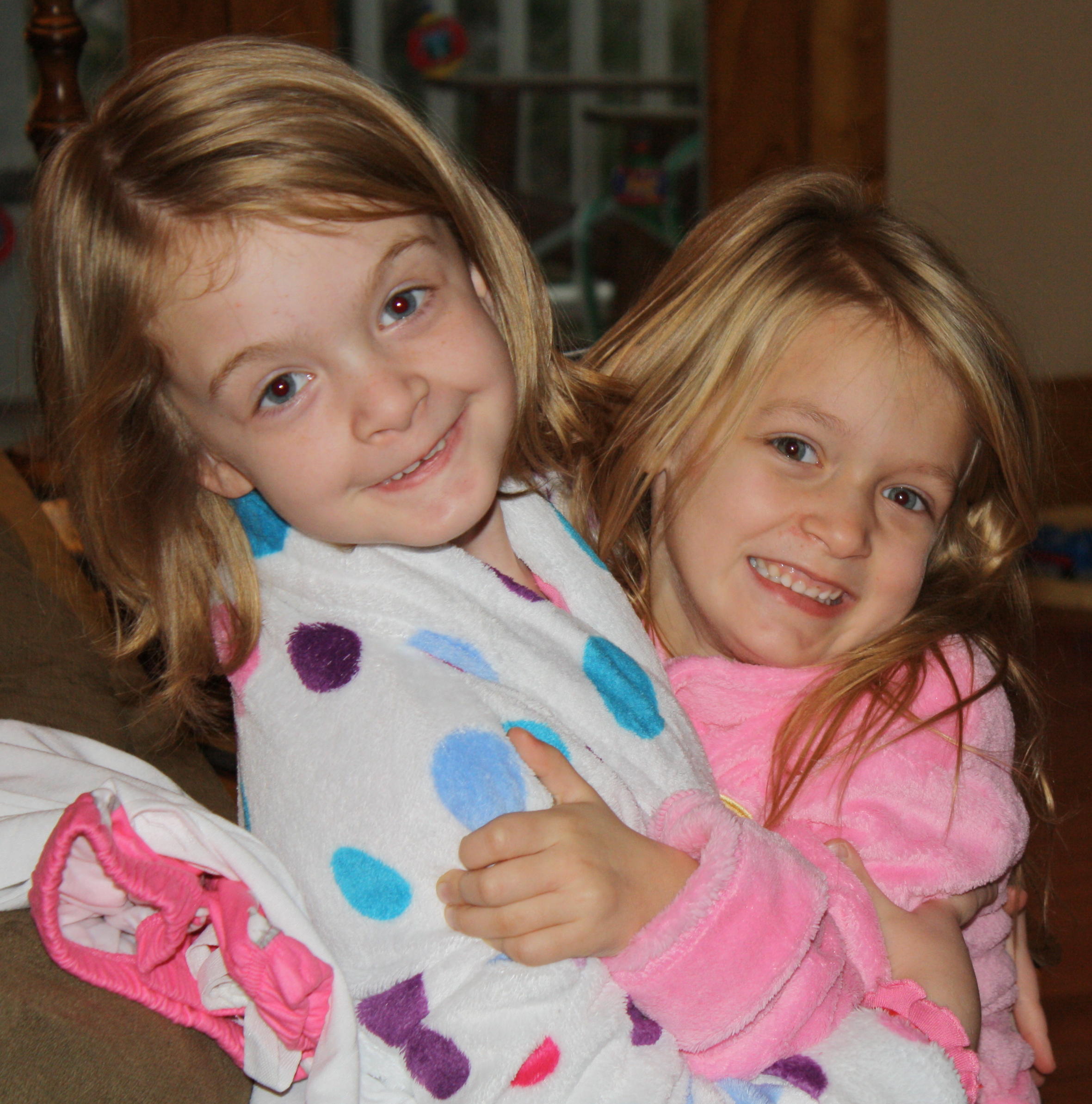 2009_12_25 Jane and Cate sharing a hug in their robes.jpg